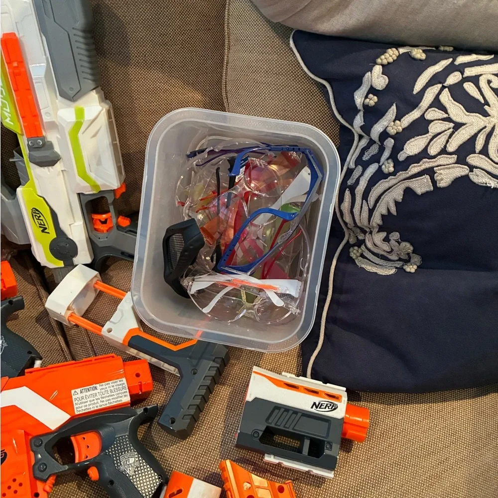 Nerf Arsenal, darts, goggles, mags, and multiple types of guns and attacments. - Picture 6 of 9